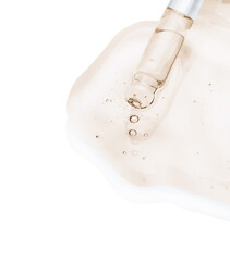 Dropper with orange cosmetic oil on white background
