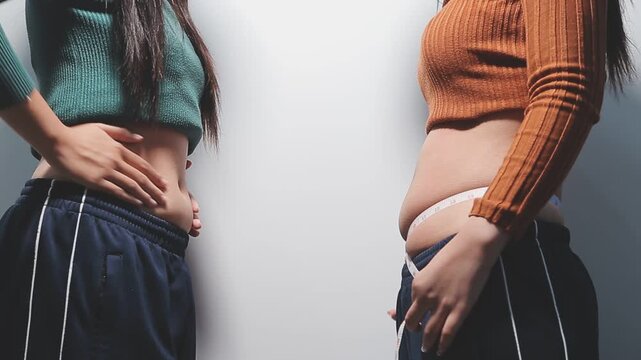 fat woman, fat belly, chubby, obese woman hand holding excessive belly fat with measure tape, woman diet lifestyle concept