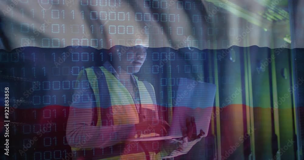 Poster binary code and flag animation over worker using laptop in industrial setting
