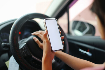 Hands Holding Smartphone To Looking Maps While Driving Car