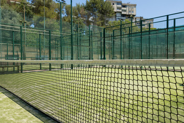 Obraz premium Close-up of net on tennis court, stadion, arena. Sport lifestyle background. The concept of professional game sports