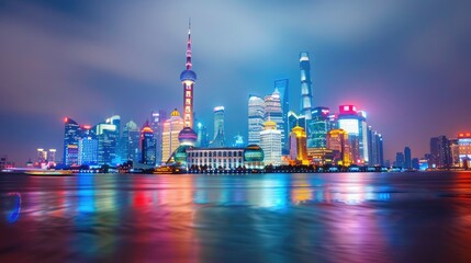 Nighttime cityscape of a vibrant skyline with colorful reflections over water, illustrating modern architecture and urban lights in a metropolis.