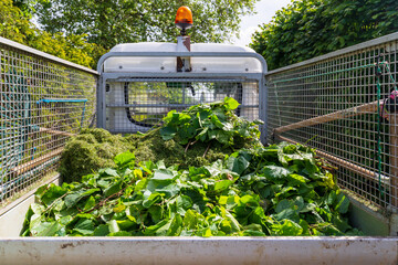 Garden Maintenance Truck with Freshly Cut Leaves and Grass