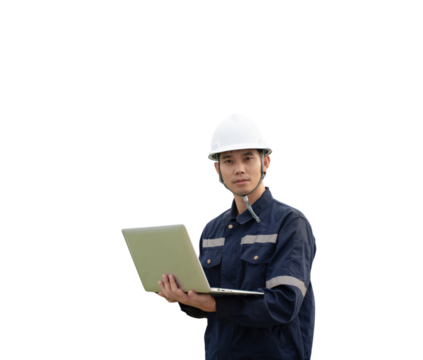 A man wearing a hard hat and a blue shirt is holding a laptop