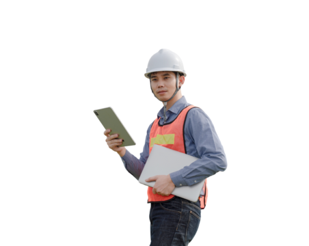 A man wearing a safety vest and a hard hat is holding a tablet and a laptop