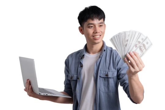 A man is holding a laptop and a stack of cash - Powered by Adobe