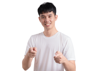 A young man with a white shirt is pointing to the camera