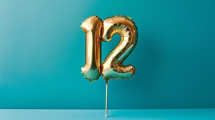 Gold inflatable number 12 on a stick on a blue background