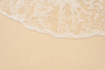 Sand and wave, topview 