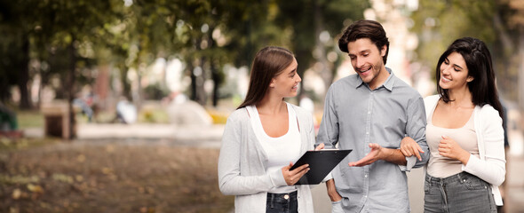 Opinion Poll. Girl Interviewing Young Couple Conducting Sociological Survey Standing Outdoor.