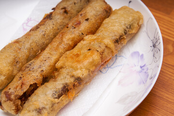 Crispy and delicious fried spring rolls close-up