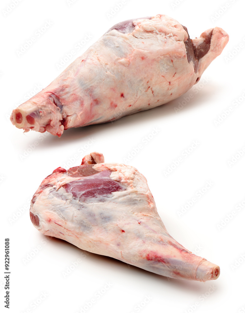 Wall mural Raw lamb leg on white background