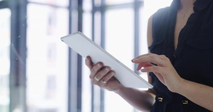 Businesswoman, tablet and hand closeup or typing for.for networking communication, planning or online connection. Female person, scroll or digital message for career in office, connectivity or search