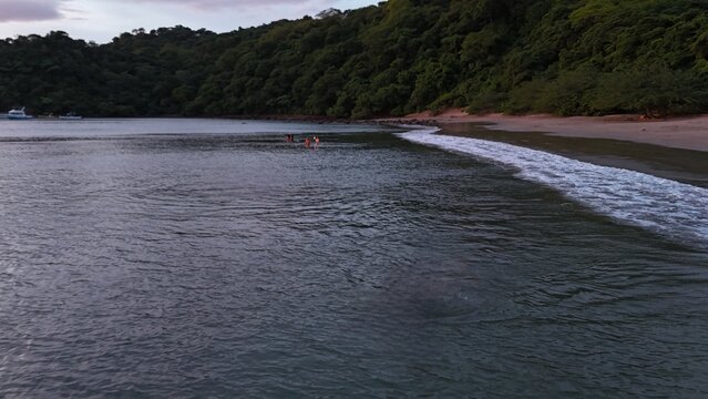 Serene Twilight at Playa El Jobo, Guanacaste; This captivating image showcases the tranquil beauty of Playa El Jobo in Guanacaste, with gentle waves lapping at the sandy shore. 