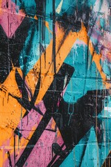Fototapeta premium A graffiti-covered wall where the colors blend into an abstract, chaotic pattern. 
