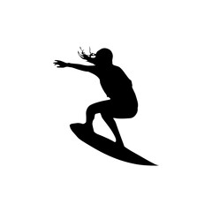 Silhouette of surfer riding strong ocean waves