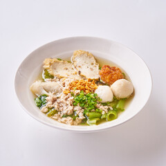 Fish ball noodles with morning glory