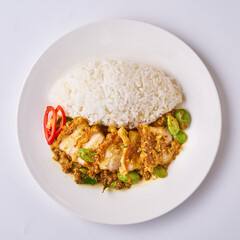 Delicious Thai Stir-Fried Tofu with Vegetables and Steamed Rice on a White Plate - Authentic Asian Cuisine