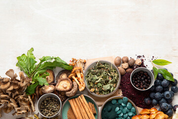 Adaptogen healthy food. Herb and spice collection on light background