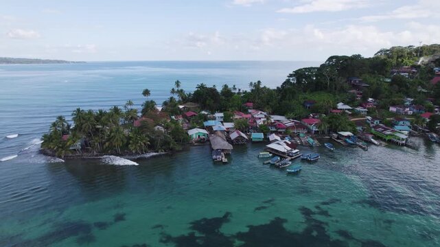 Tropical Island Bastimentos in Panama, caribbean village, houses and moored fishing boats, aerial
