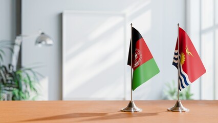 FLAGS OF AFGHANISTAN AND KIRIBATI ON TABLE