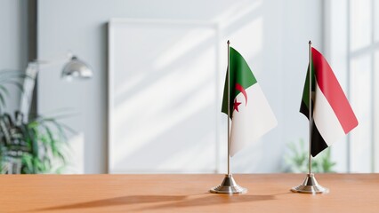 FLAGS OF ALGERIA AND SUDAN ON TABLE