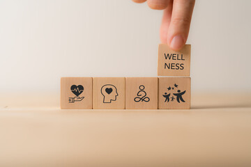 Wellness concept. Wooden cube blocks with health, mindfulness, mental health, happiness, financial...