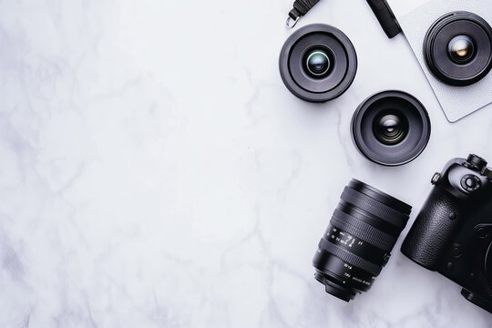 Professional photography equipment lying on a white marble table forming a background for world photography day