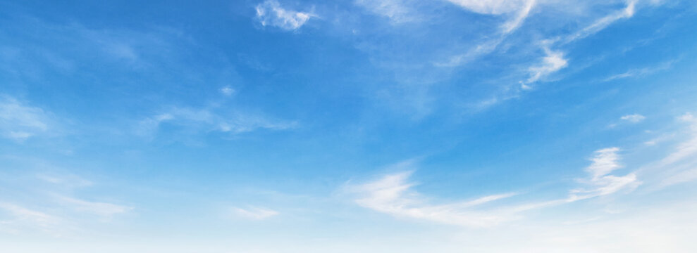 clear blue sky with a few clouds