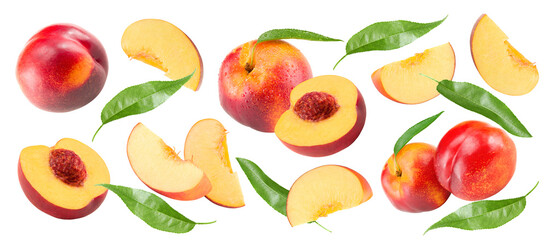 flying cuts of peach fruit with green leaf isolated on white background. clipping path