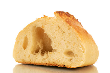 One half of white bread, macro, isolated on white background.