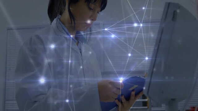Scientist working in lab with network connections animation over her