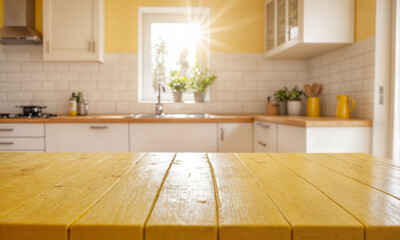Empty wooden table with the bright white interior of the kitchen as a blurred background behind the bokeh
