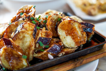 A delicious Chinese dish, deep fried eggplant stuffed with meat