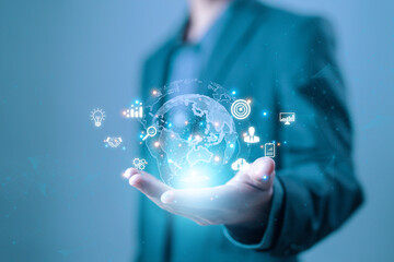 hand shows the globe of digital marketing. concept business tech international market. global...