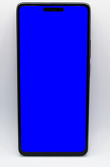 selective focus isolated on white, cellphone or smartphone with blue screen