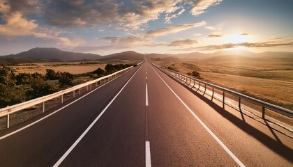 Fototapeta premium an empty asphalt highway with a straight track