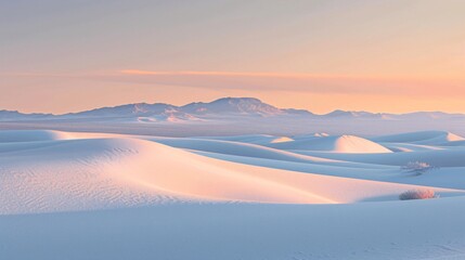 Fototapeta premium Serene desert scene at dusk with calm sand dunes and a peaceful twilight sky.