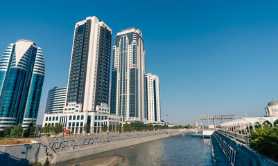 Naklejka premium high skyscrapers on the banks of the river in Grozny Chechnya