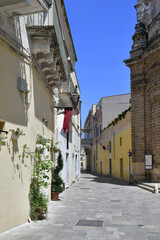 A narrow street in the historic center of Nardò, a tourist town in Puglia in Italy.