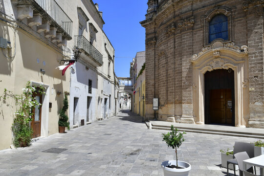 A narrow street in the historic center of Nard&ograve;, a tourist town in Puglia in Italy.