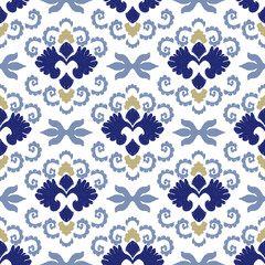 ikat seamless pattern showcases elegant blue and gold ikat motifs on a white background. Ideal for fabric designs, home decor, and stationery
