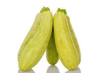 Several ripe zucchini, macro, isolated on white background.