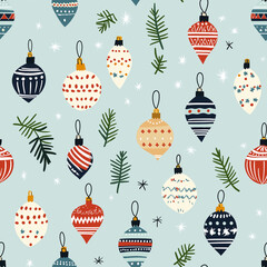 A seamless pattern with Christmas ornaments and pine branches on a light blue background, evoking a nostalgic holiday atmosphere.