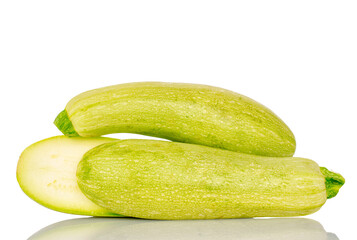 Several ripe zucchini, macro, isolated on white background.