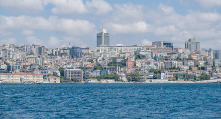 Fototapeta premium Scenic Bosphorus view of Istanbul's coastline, where historic landmarks