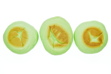 Round green bread isolated on white background