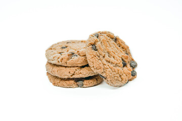 Isolated clipping path of dark chocolate chip cookie on white background. Biscuits with chocolate topping. Cookies isolated on white background