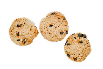 Isolated clipping path of dark chocolate chip cookie on white background. Biscuits with chocolate topping. Cookies isolated on white background