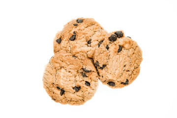 Isolated clipping path of dark chocolate chip cookie on white background. Biscuits with chocolate topping. Cookies isolated on white background